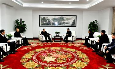 汤明拜会重庆市江津区委副书记、区长谭庆