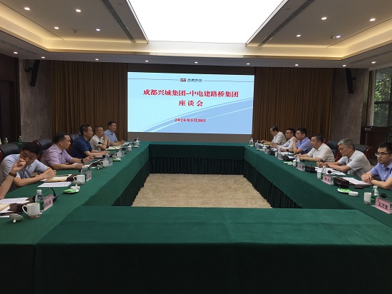汤明拜会成都兴城集团董事长任志能