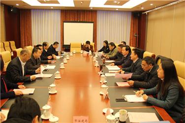 汤明拜会乐山市市长张彤